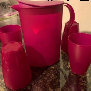 Tupperware set color magenta 4 16oz cups and1/2 gallon pitcher brand new